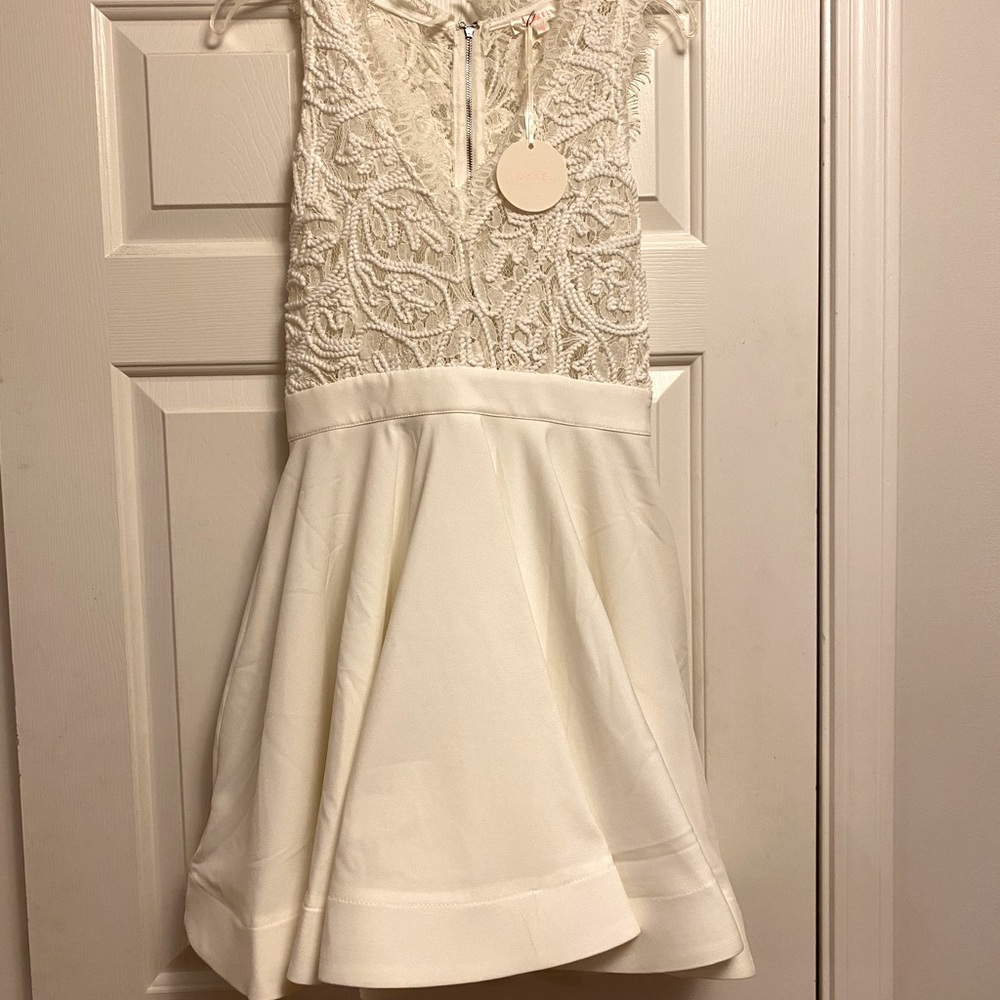 Never worn white dress